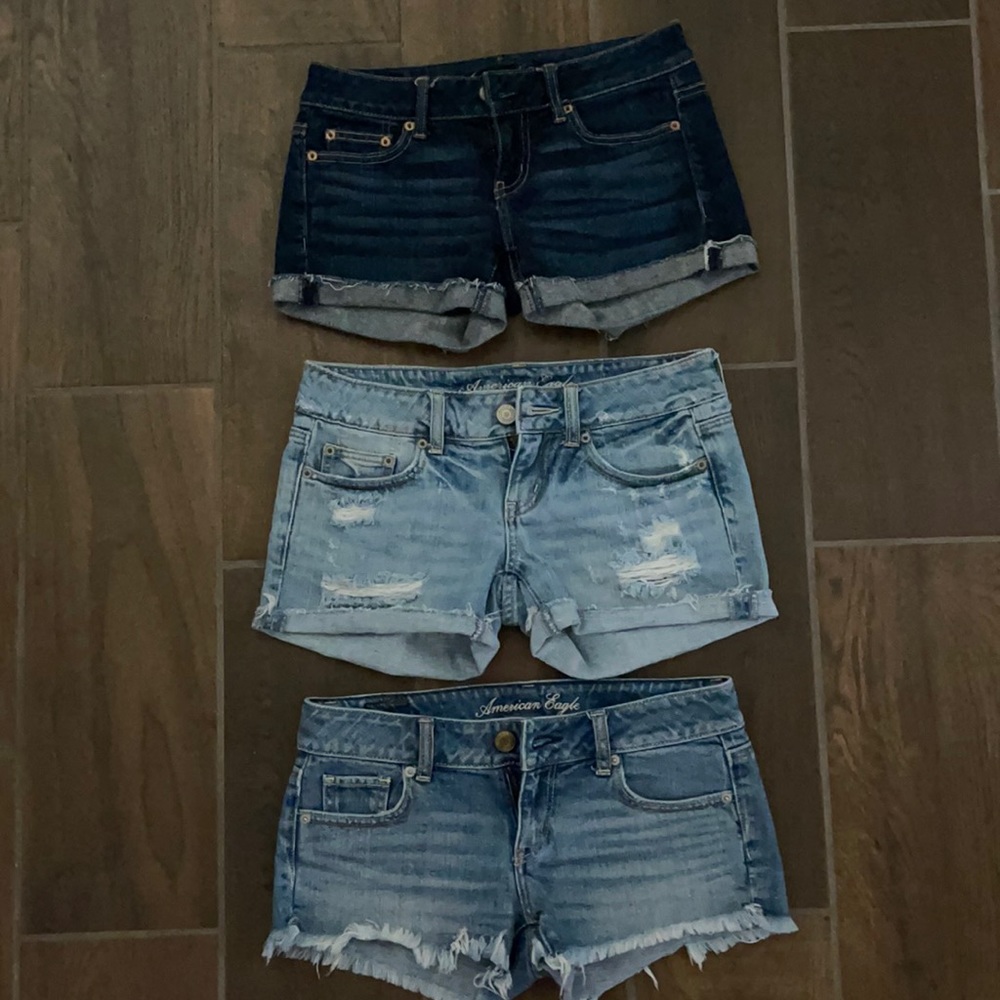 3 pairs of Size 0 American Eagle jean shorts.